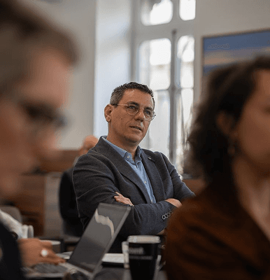 Analyst reviewing Talvrin research answers