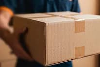 Hands holding a cardboard package