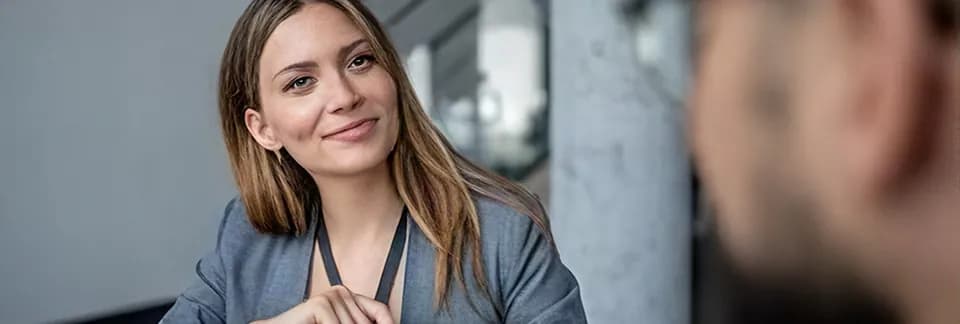 Colleague listening during a conversation in an office