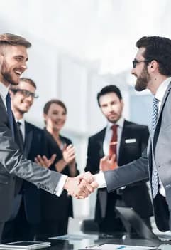 Colleagues shaking hands after a meeting