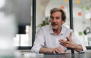 Colleague explaining something during a discussion