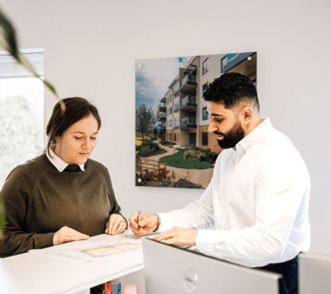 Professionals reviewing documents together