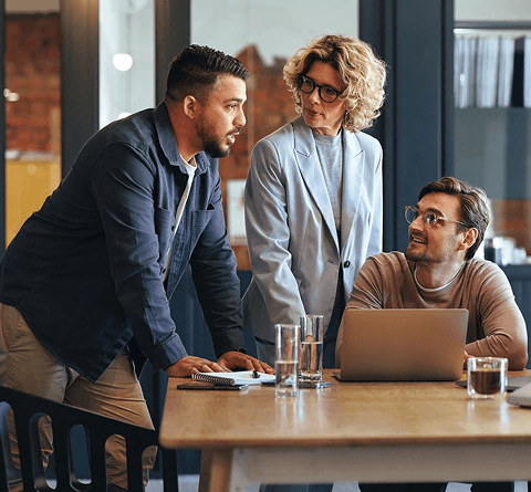 Colleagues discussing accessibility in a workplace