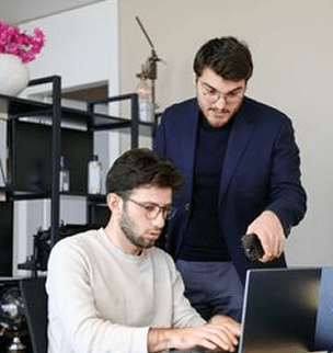 Editorial team using AI-assisted research tools